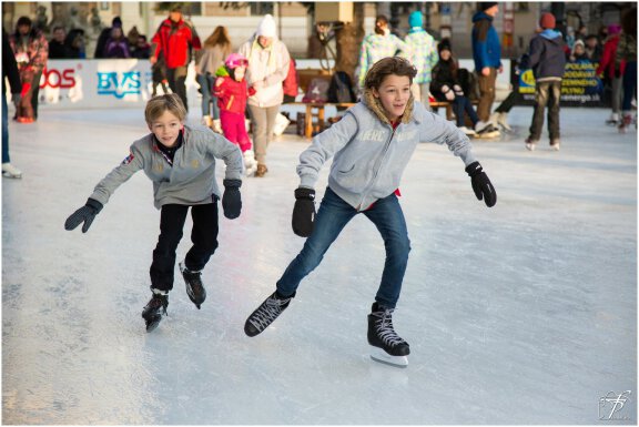 Young Boys Ice Skating